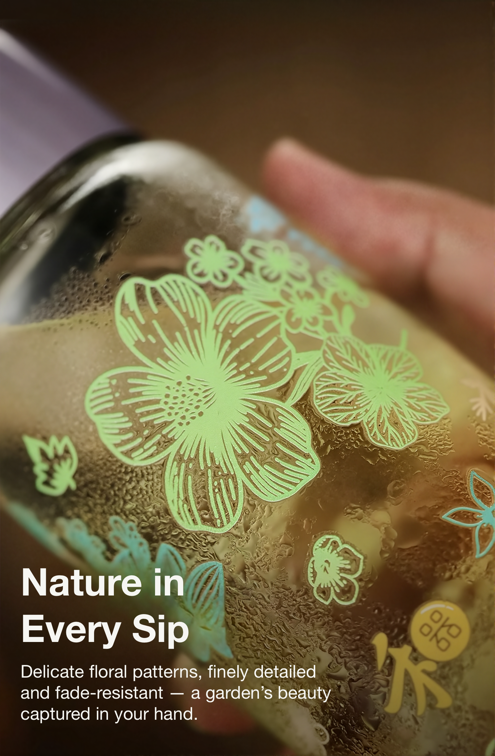 Close-up of a can with floral designs and text about nature in every sip.