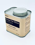 Heng Yin Hion Almond Aroma DanCong Oolong loose-leaf tea in a minimalist beige metal tin, Phoenix Mountain 900m+ origin.