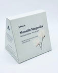 Moonlit Magnolia DanCong Oolong boxed packaging by Jaktea, shown in a pale blue triangular carton with illustrated magnolia flowers and clean minimal design.