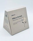 Silken Orchid DanCong Oolong gift box by Jaktea, featuring minimalist design and soft orchid floral illustration.